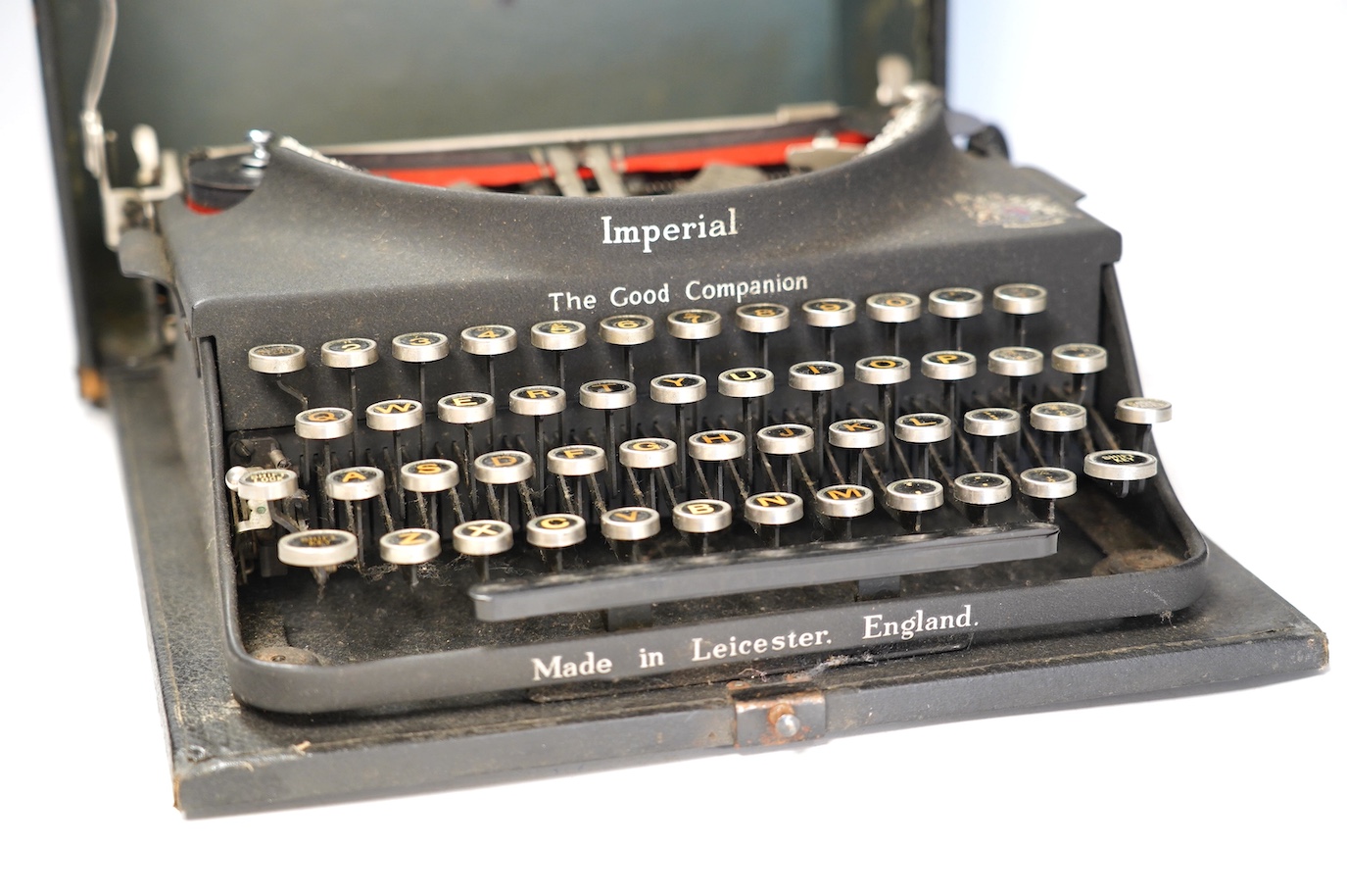 An Imperial portable typewriter, The Good Companion. Condition - poor to fair, some wear, minor damage and losses and surface rust to metal parts on the case